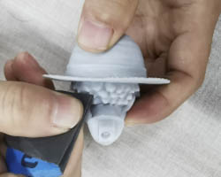 Sandpaper (or Sanding sponge)