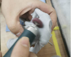 Cleansing cloth sanding head